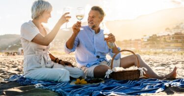Retired couple drinking wine