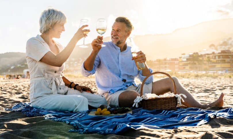 Retired couple drinking wine