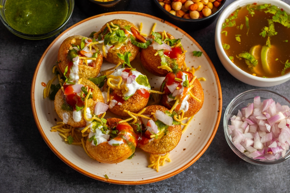 selective focus of Indian popular snack "papri chaat" or "pani puri". 